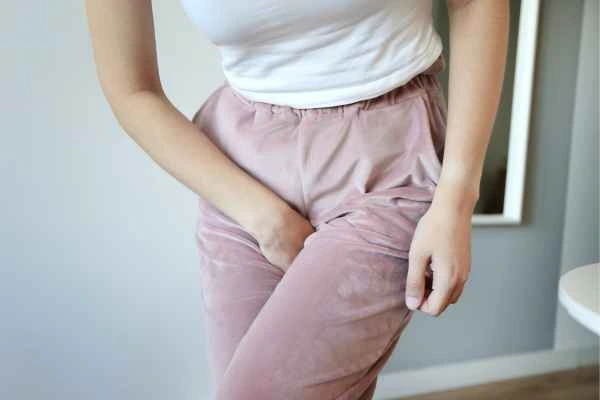 woman struggling with urine incontinence Woolwich